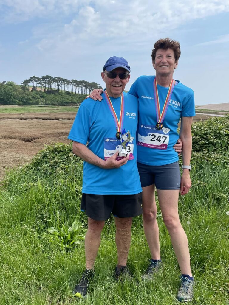 Janet and Dennis Celebrate Milestones at Jurassic Coast 10K 2025