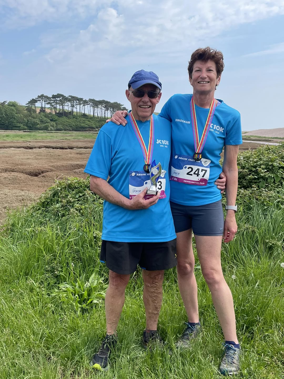Janet and Dennis Celebrate Milestones at Jurassic Coast 10K 2025