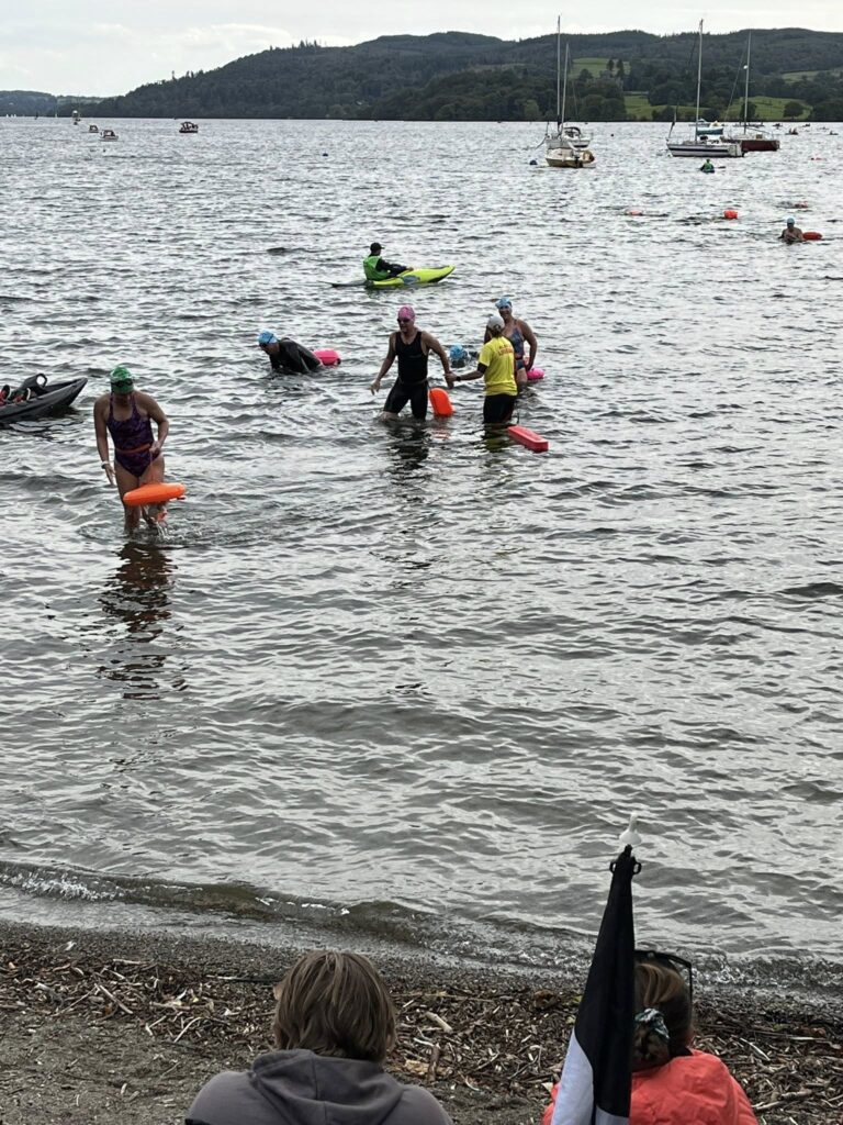 Janna completing the Chillswim Windermere End to End 11-mile swim without a wetsuit