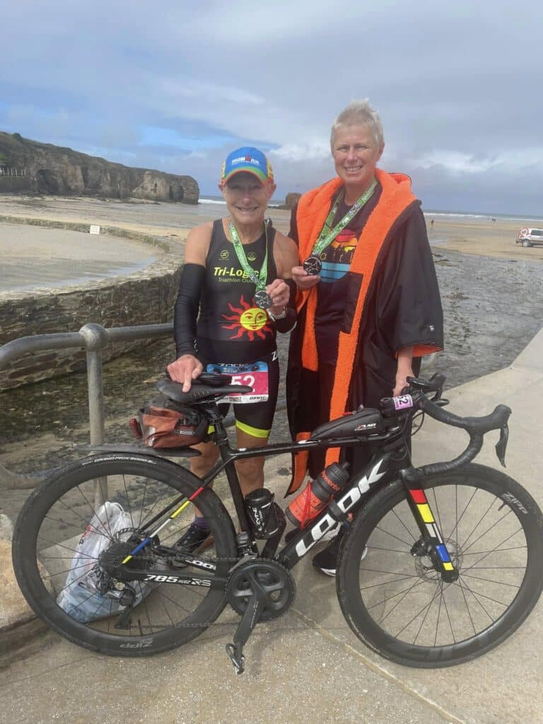 Carn Runners team competing at the Perranporth Triathlon Relay with surf swim, cycling and beach run