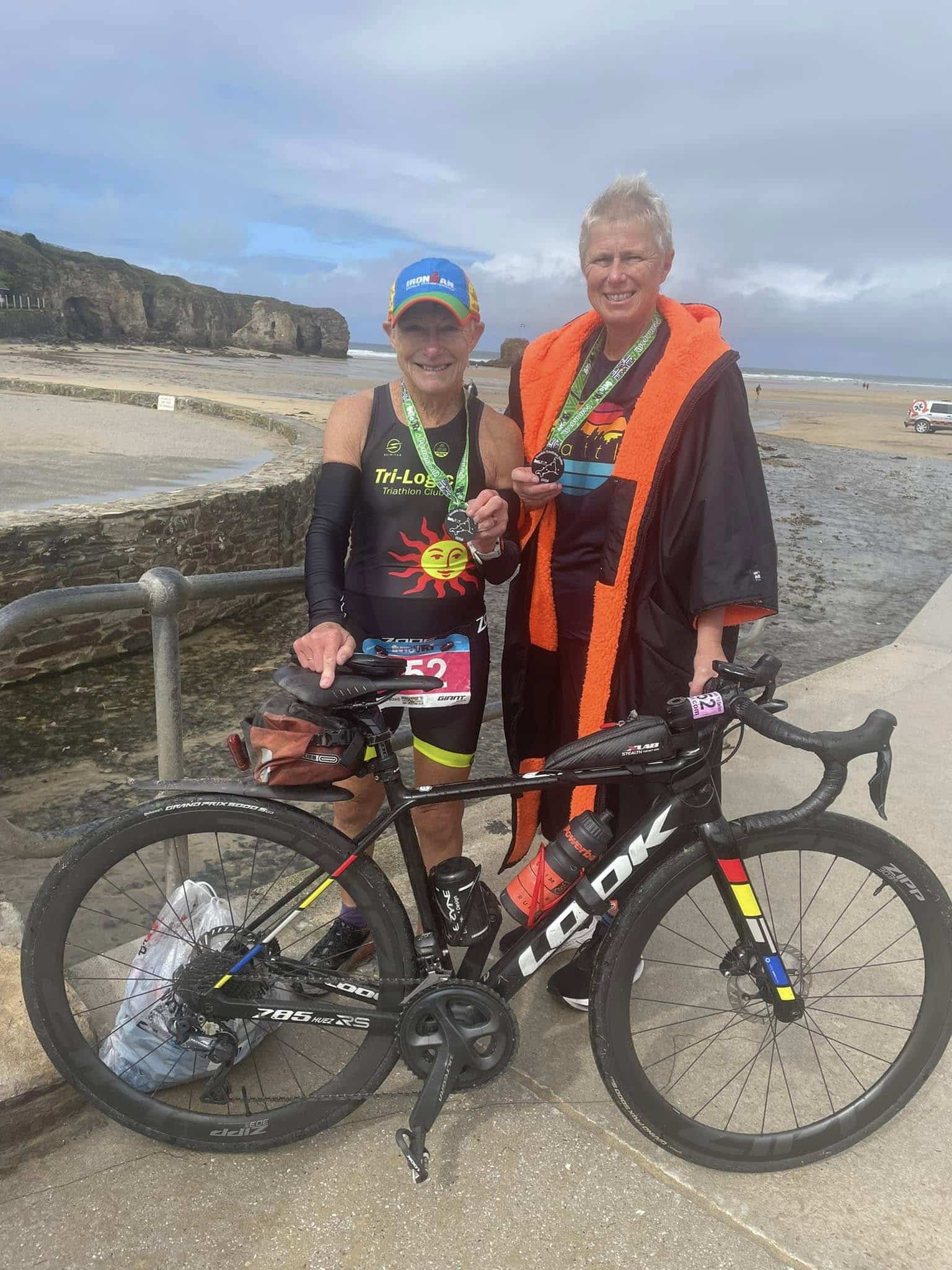 Carn Runners team competing at the Perranporth Triathlon Relay with surf swim, cycling and beach run