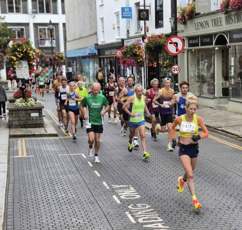 Carn Runners team at the Truro Half Marathon finish line in Cornwall