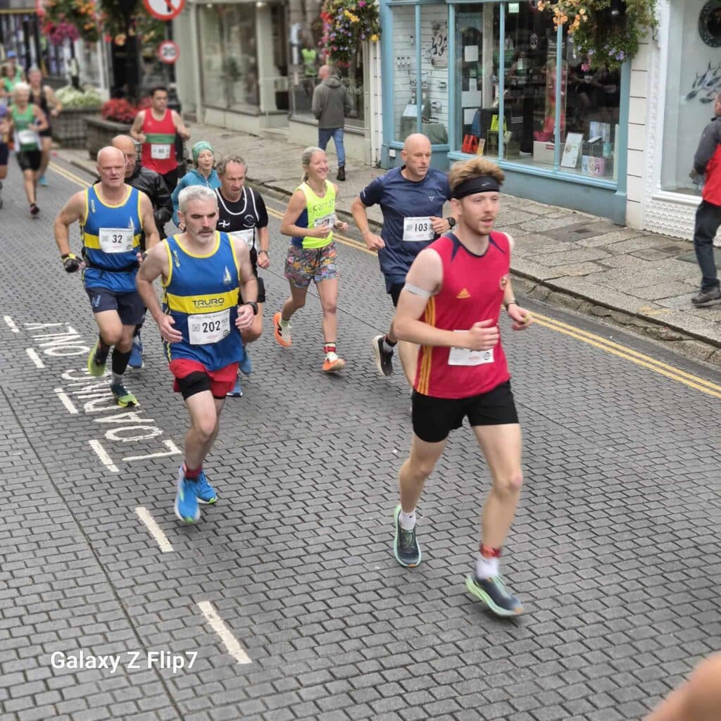 Carn Runners team at the Truro Half Marathon finish line in Cornwall