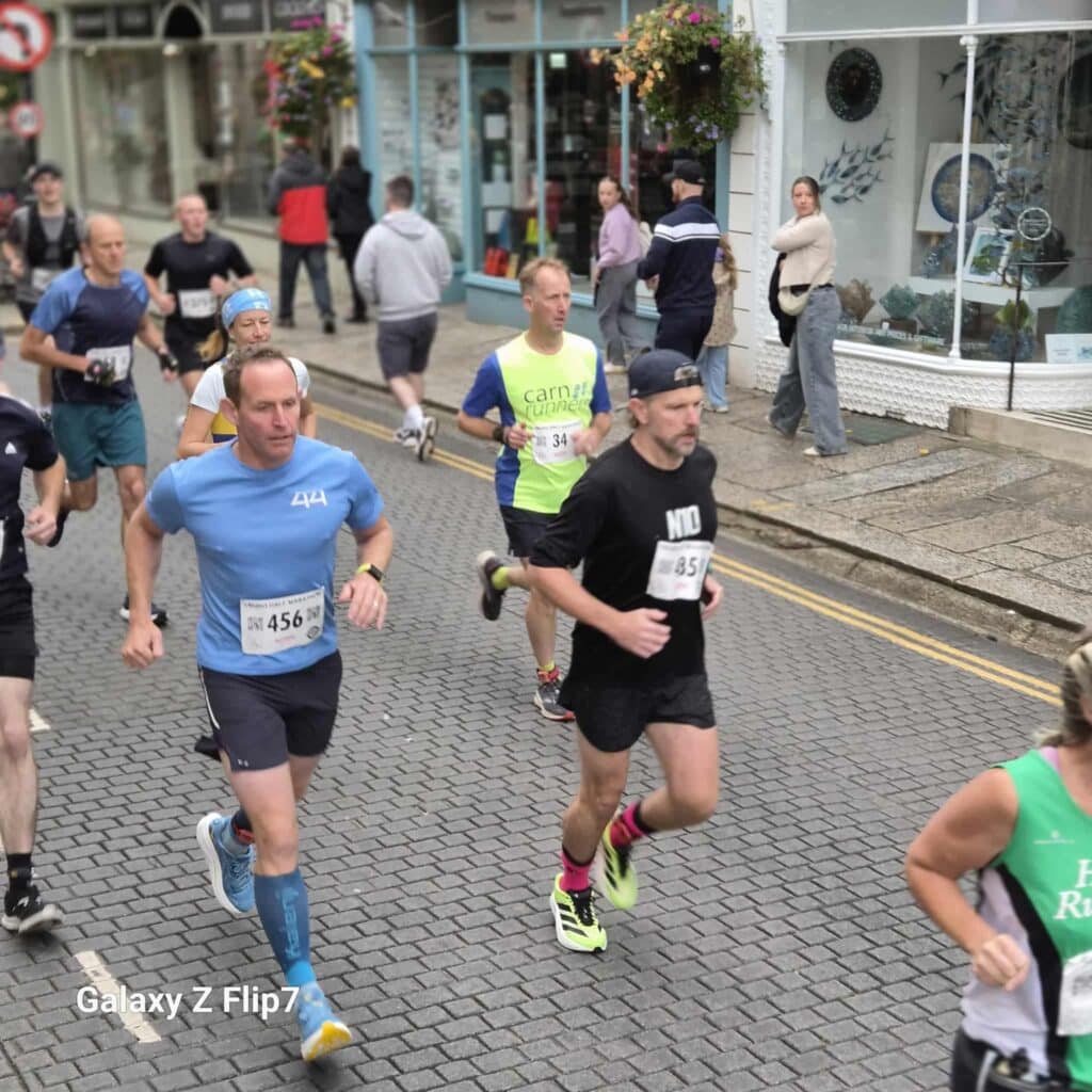 Carn Runners team at the Truro Half Marathon finish line in Cornwall