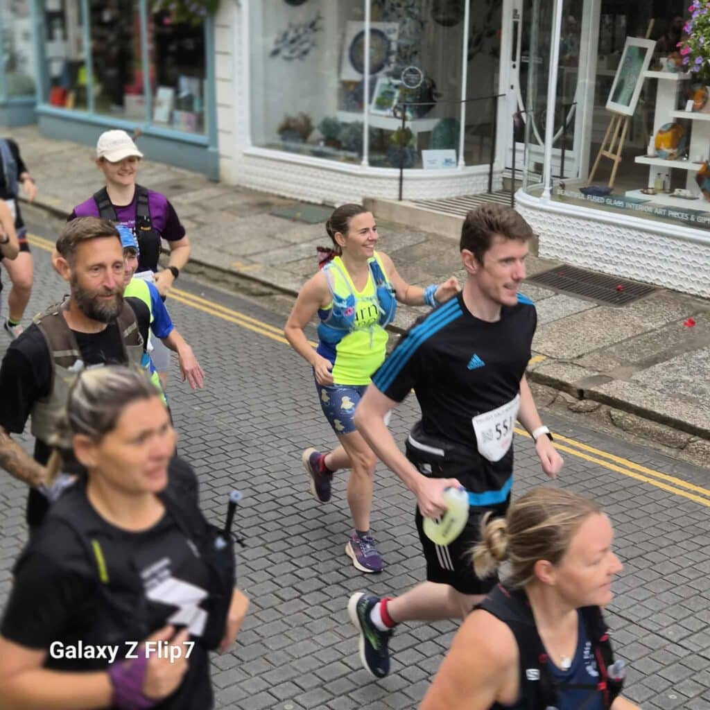 Carn Runners team at the Truro Half Marathon finish line in Cornwall