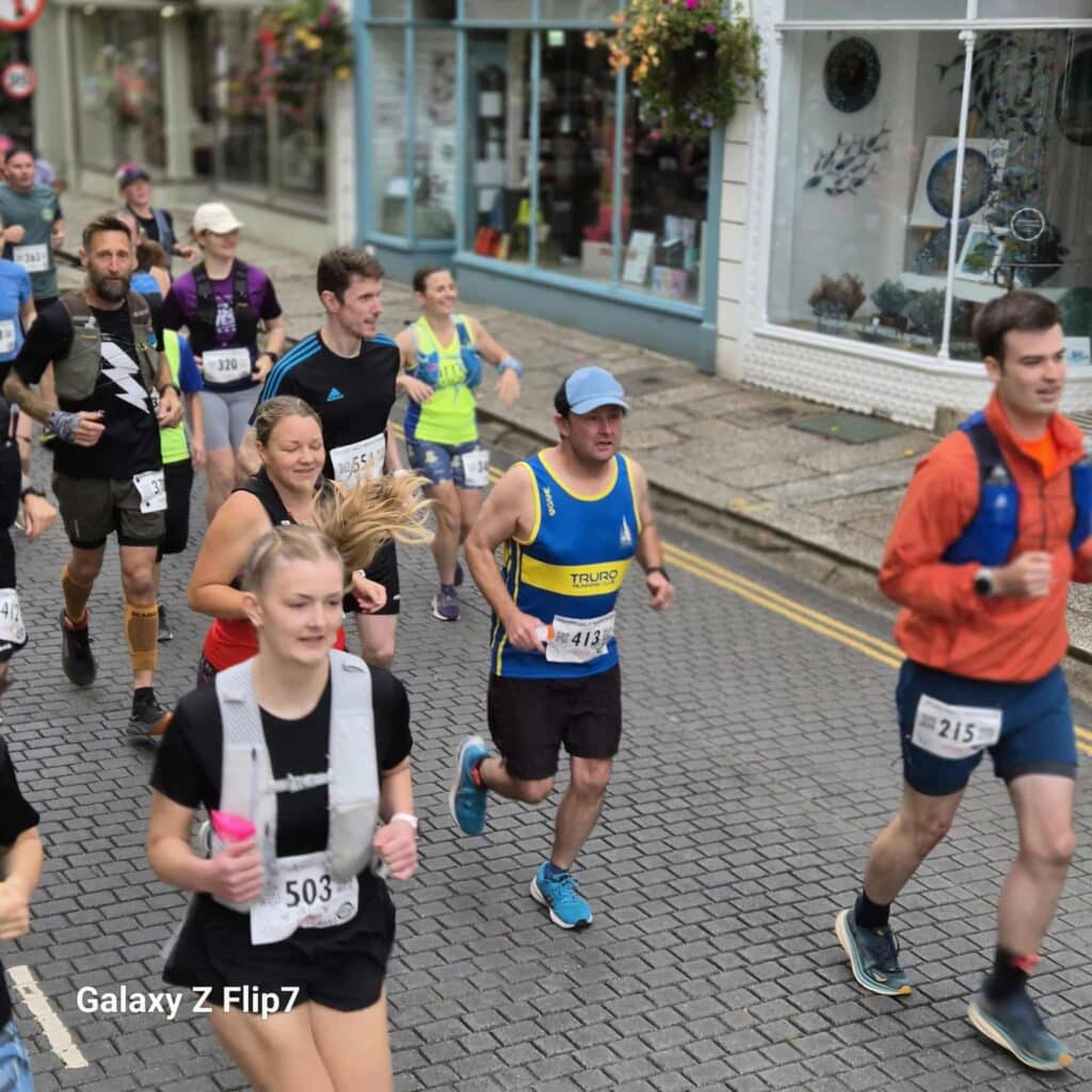 Carn Runners team at the Truro Half Marathon finish line in Cornwall