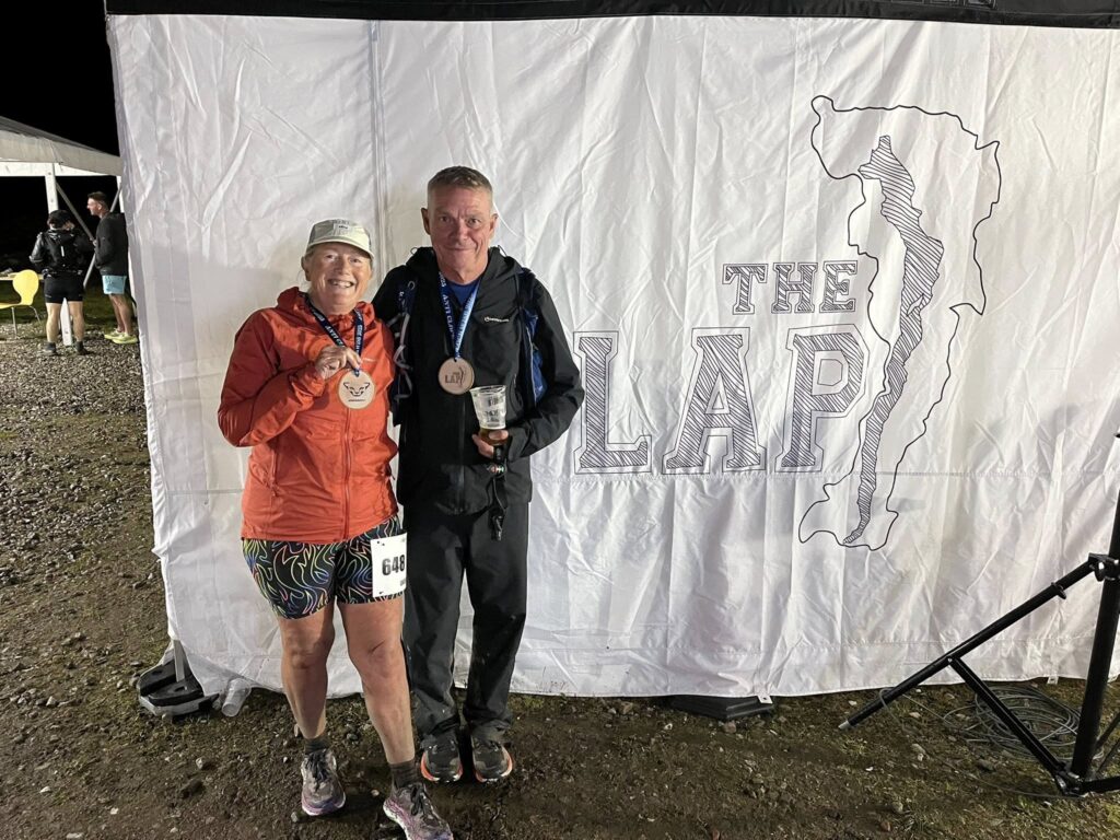 Laura and Andy running The Lap 47-mile ultra around Windermere fells