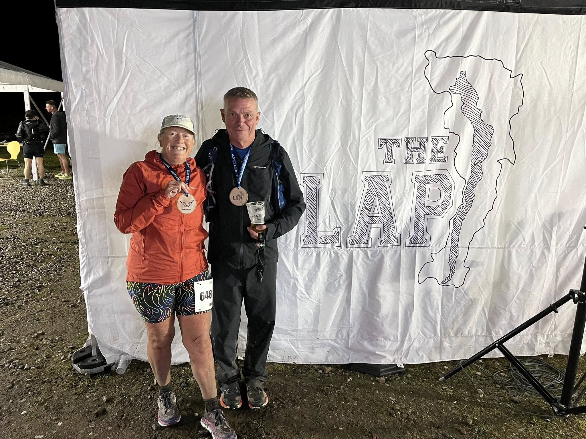 Laura and Andy running The Lap 47-mile ultra around Windermere fells
