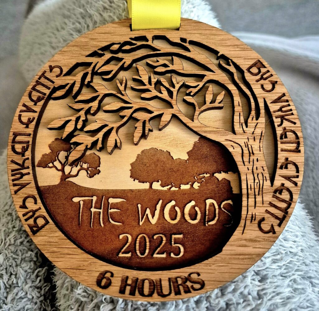 Carn Runners tackling The Woods endurance run in Tehidy Woods, Cornwall, in heavy rain