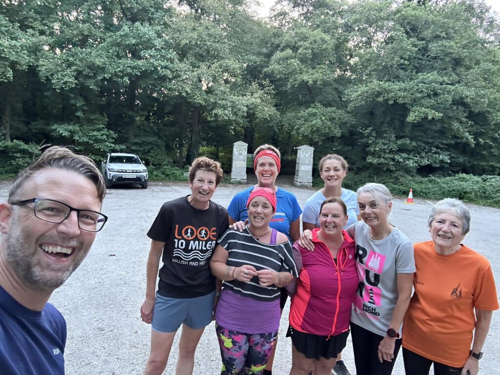 Carn Runners Friday group running together in Tehidy Woods, Cornwall
