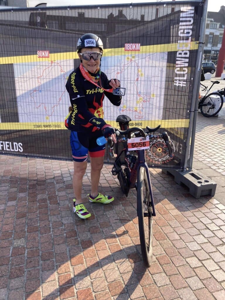 Janet competing in the Long Course Weekend Belgium triathlon and enjoying Belgian food