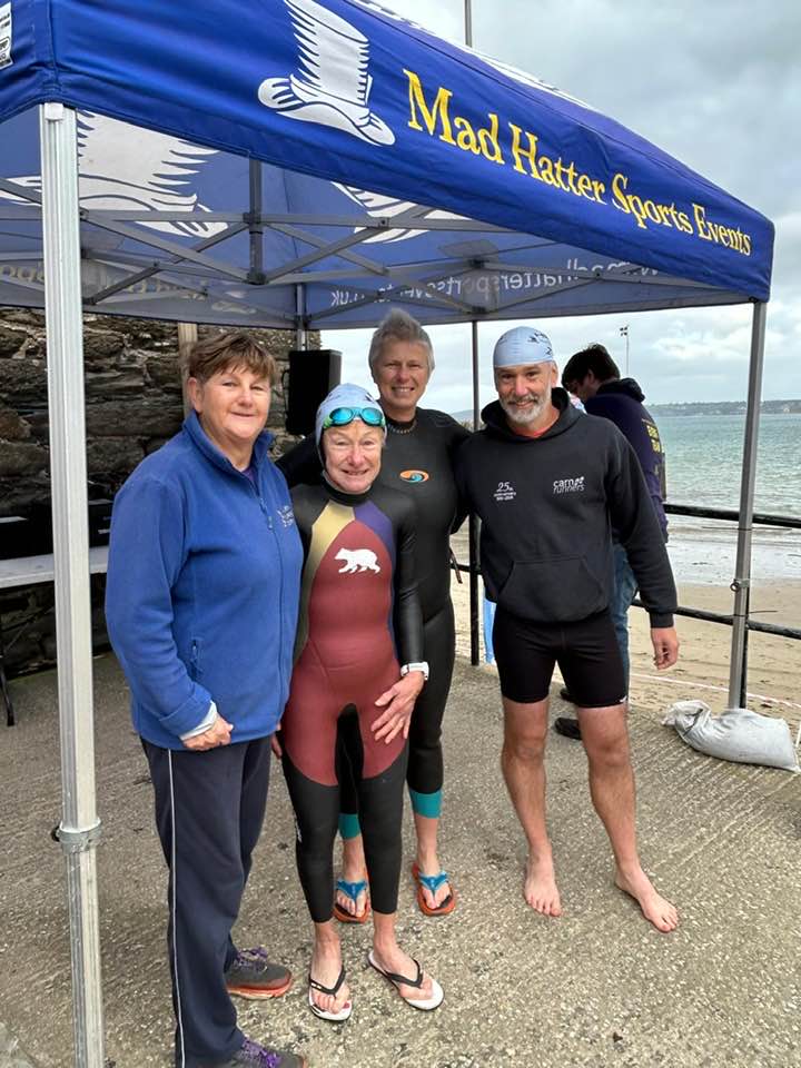 Carn Runners competing at the Polkerris Aquathon 2025