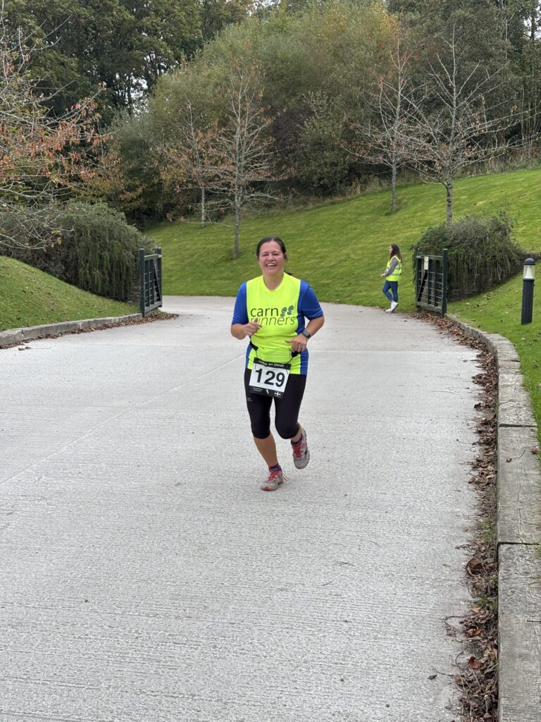 Zoe running at the Duchy an Dinas 5 Miler near Restormel Castle