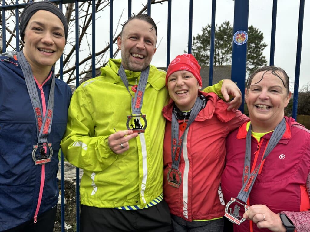 Carn Runners completing the Virtual Warhorse 10K in the rain