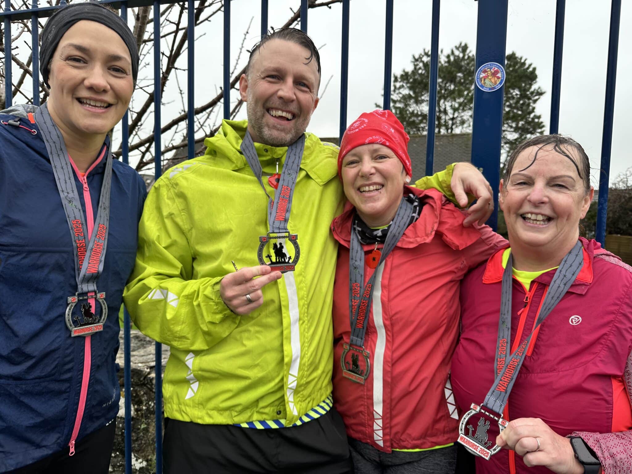 Carn Runners completing the Virtual Warhorse 10K in the rain