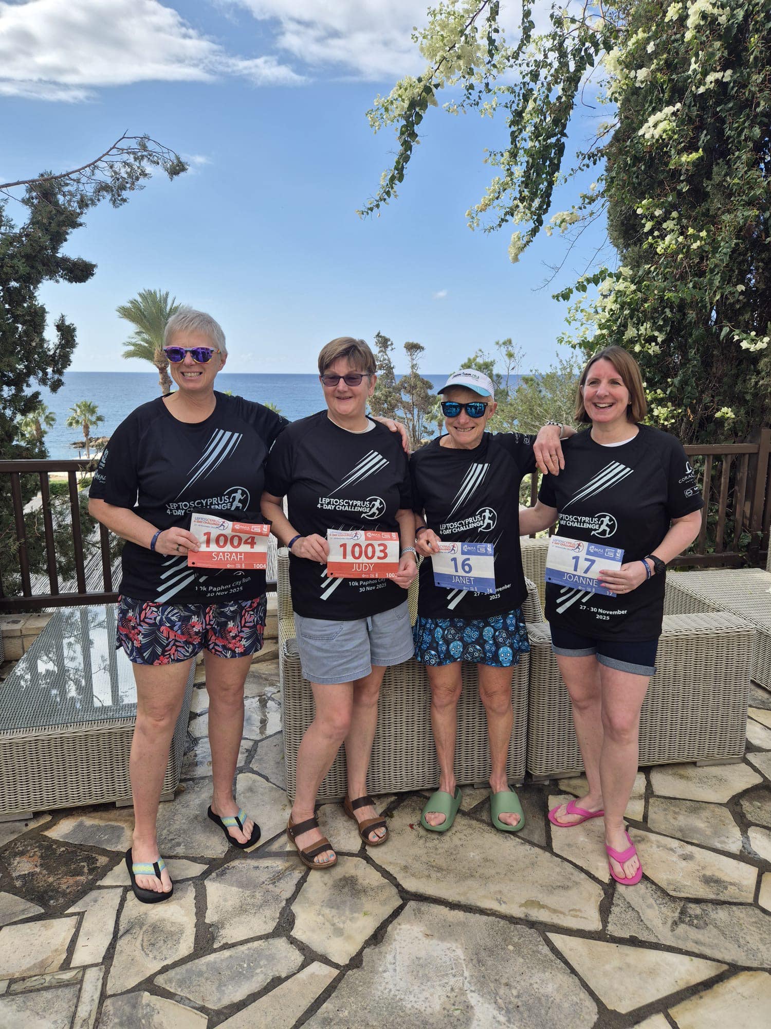 Carn Runners team enjoying the Leptos Cyprus 4 Day Challenge in Cyprus, celebrating after finishing multiple stages of the event.