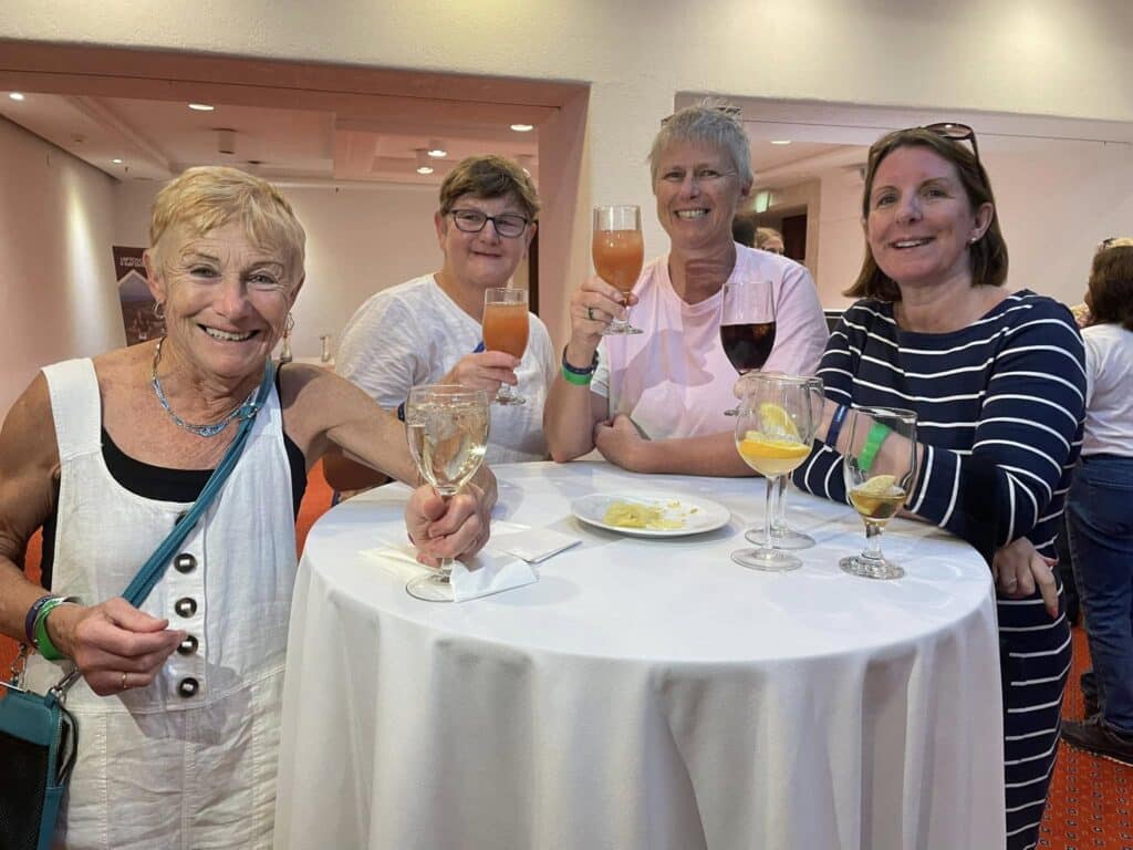 Carn Runners team enjoying the Leptos Cyprus 4 Day Challenge in Cyprus, celebrating after finishing multiple stages of the event.