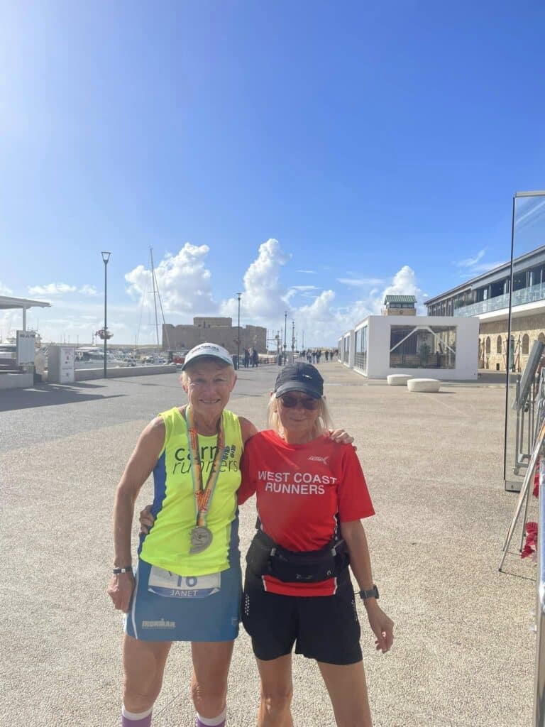 Carn Runners team enjoying the Leptos Cyprus 4 Day Challenge in Cyprus, celebrating after finishing multiple stages of the event.