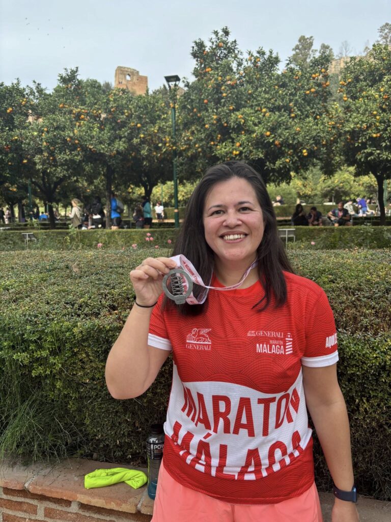 Zoe and Steve celebrating after racing at the Generali Maratón de Málaga in Spain.