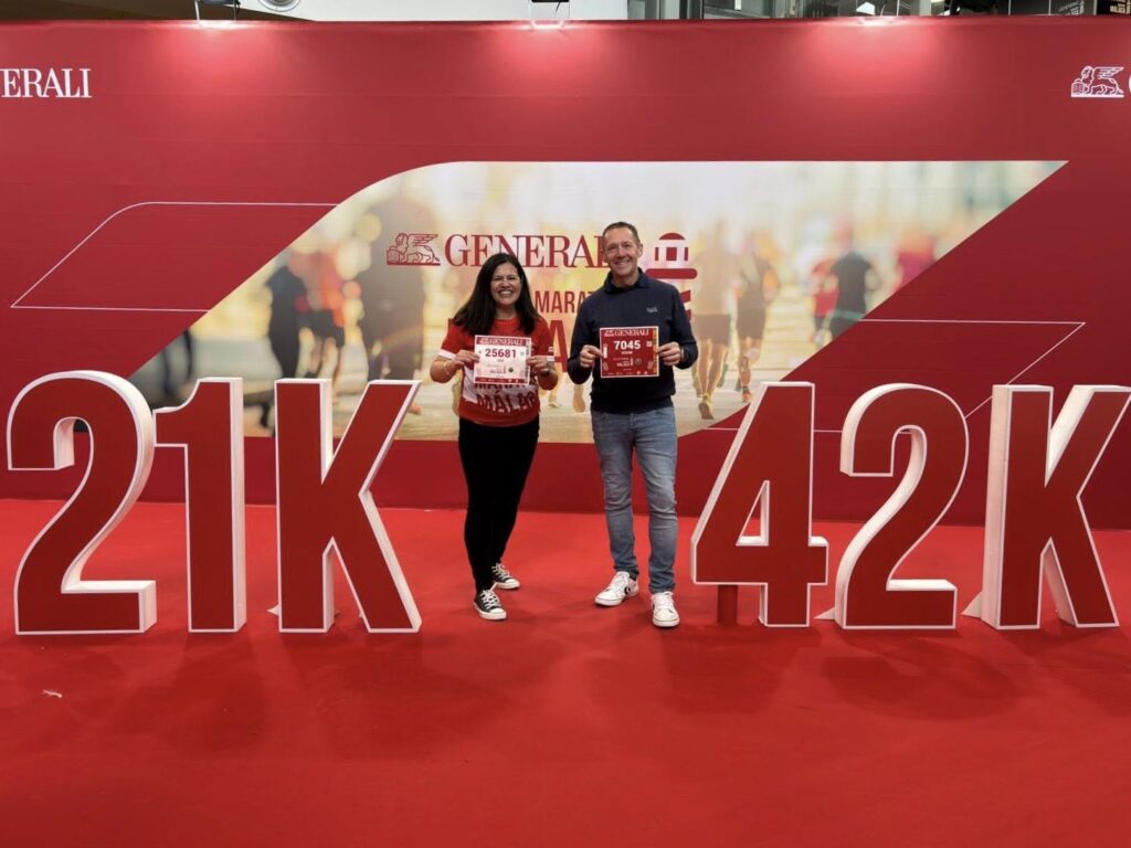Zoe and Steve celebrating after racing at the Generali Maratón de Málaga in Spain.