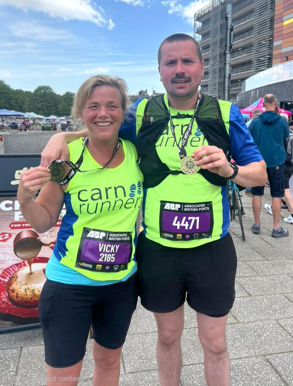 Carn Runners Vicky and Chris completing their first marathon at Newport Marathon