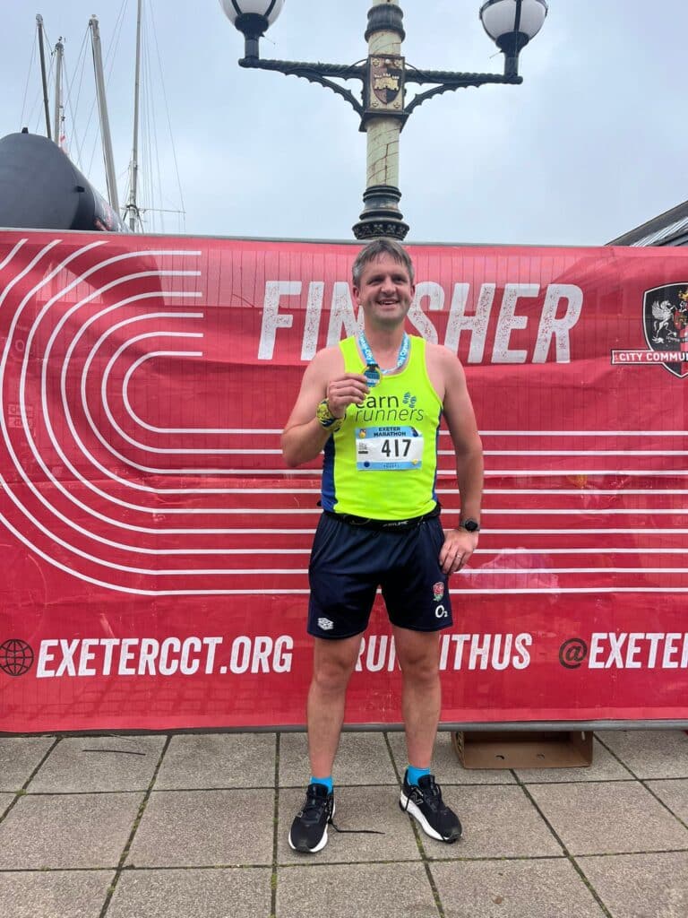 Carn Runners James and Claire completing the Exeter Marathon with strong performances