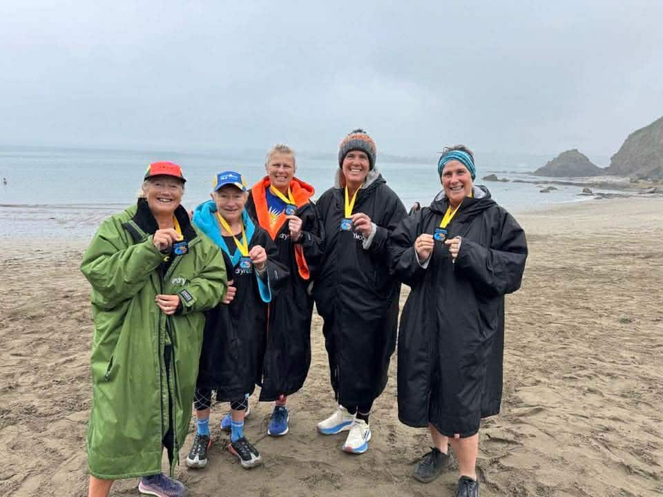 Carn Runners swim-run team at the Mad Hatter Aquathlon in Polkerris Cornwall