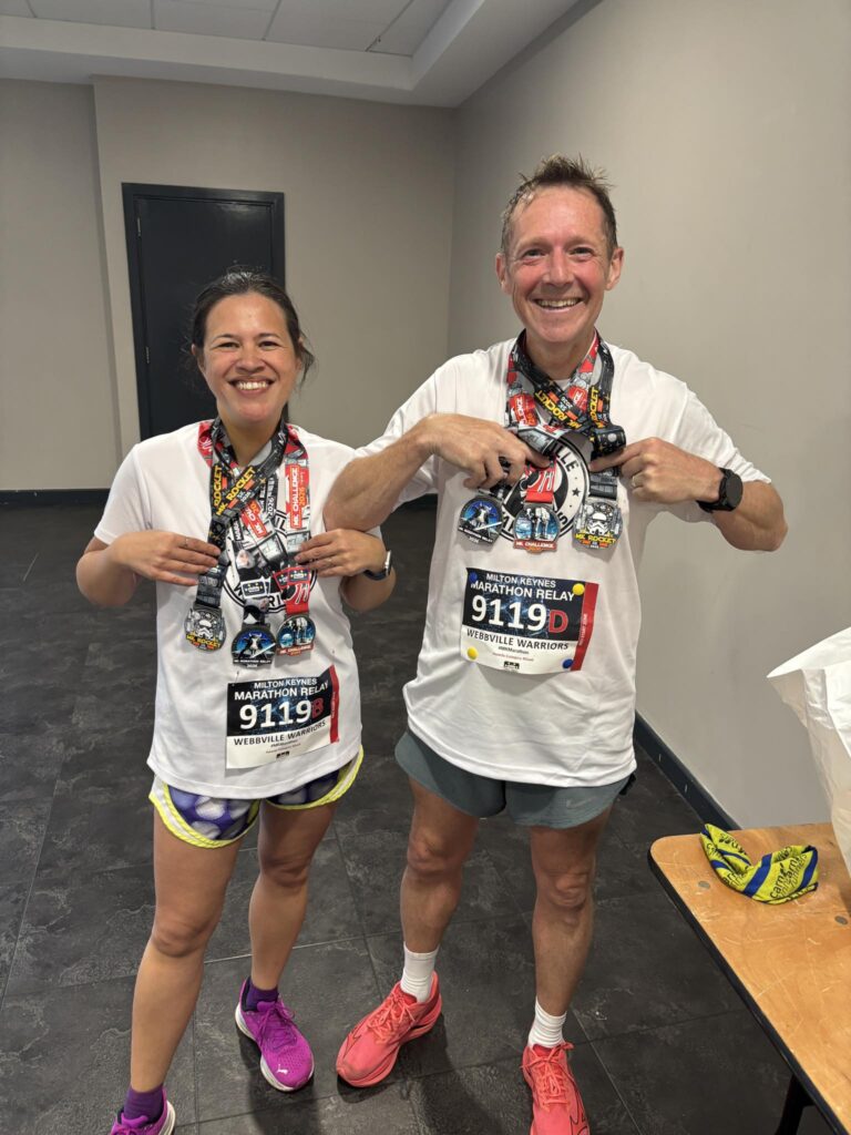Carn Runners Steve and Zoe with medals at Milton Keynes Running Festival