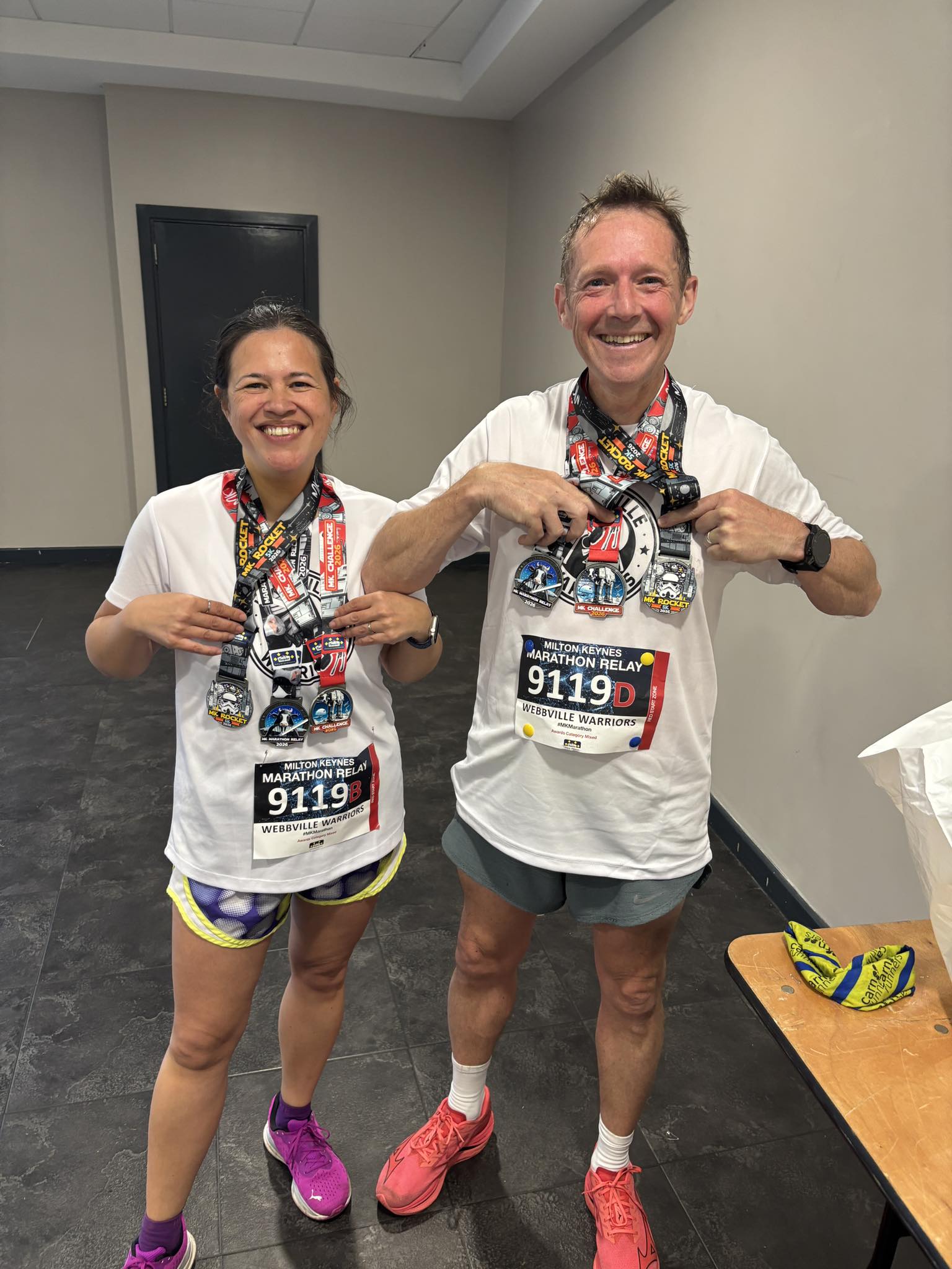 Carn Runners Steve and Zoe with medals at Milton Keynes Running Festival
