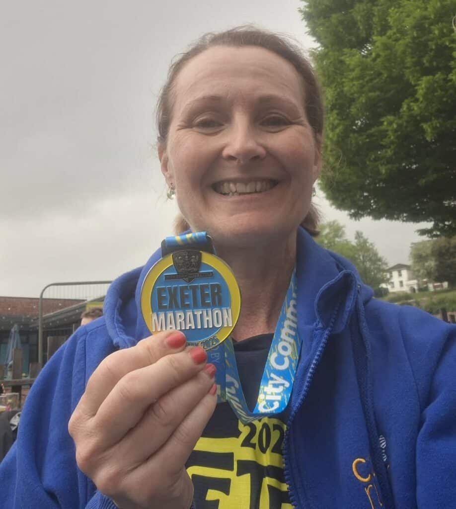 Carn Runners James and Claire completing the Exeter Marathon with strong performances