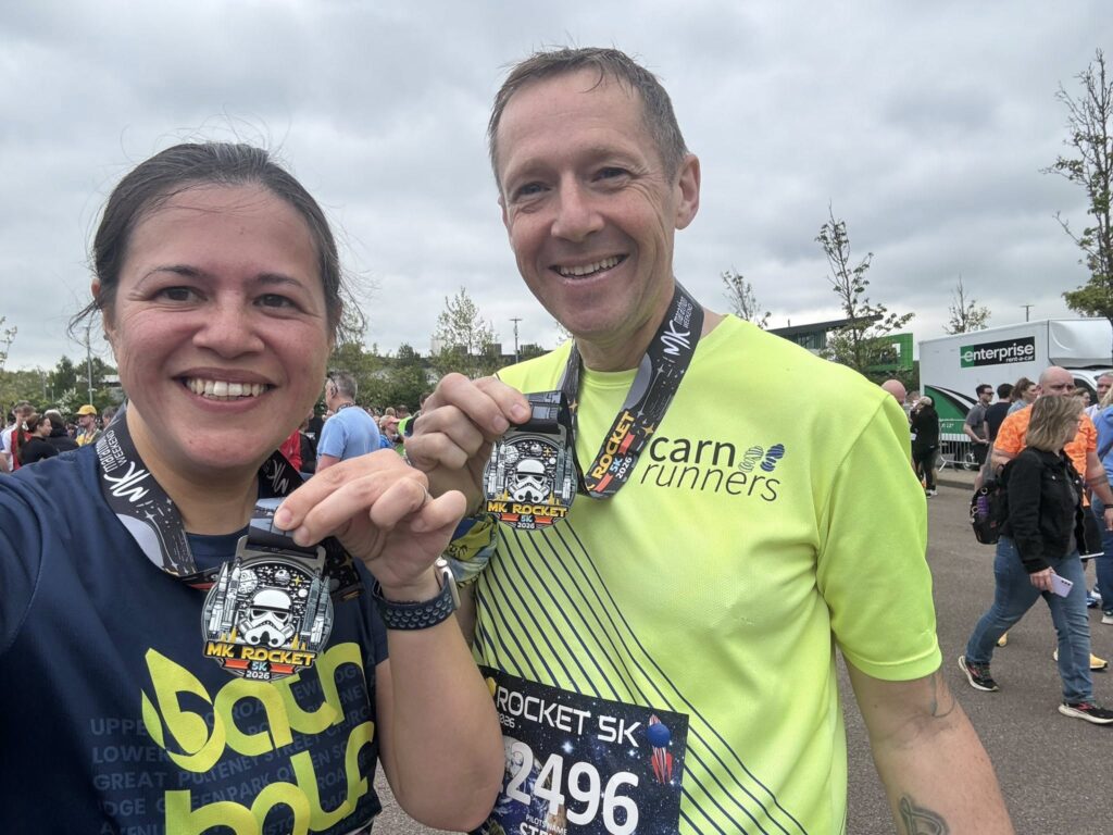 Carn Runners Steve and Zoe with medals at Milton Keynes Running Festival