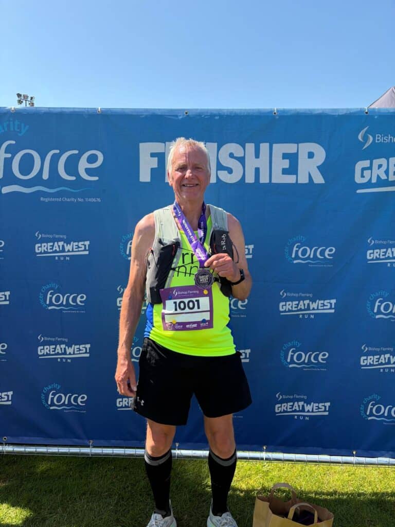 Carn Runners member Mike running the Great West Run half marathon in Exeter