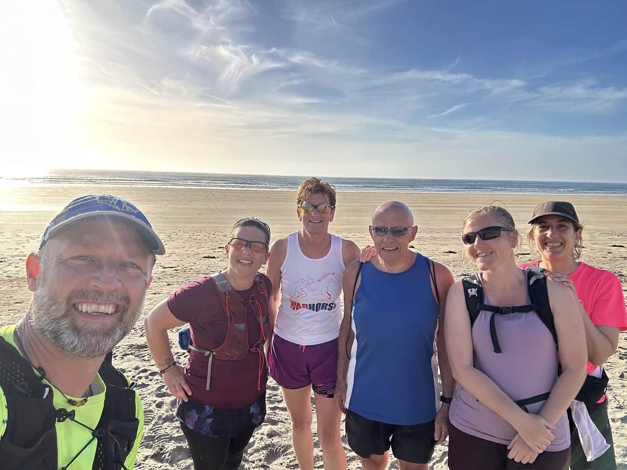Carn Runners enjoying a social run and sea swim on the Cornish coast