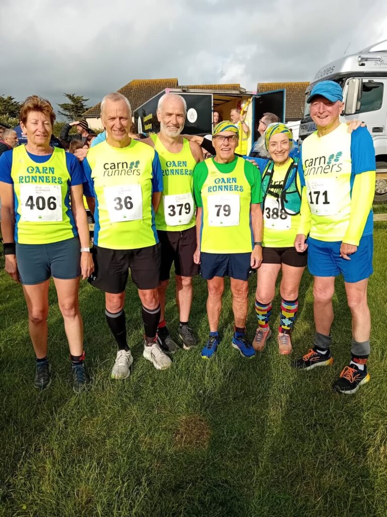 Carn Runners competing at the Bude Lifeboat Run with age category winners Peter and Dennis