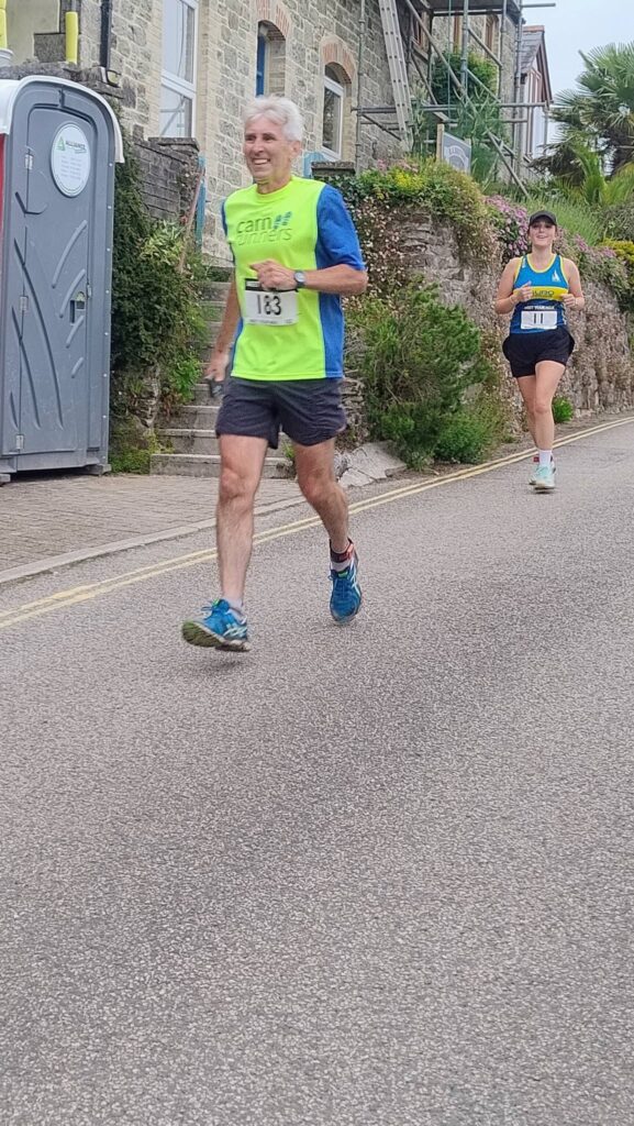 Carn Runners competing at the Meet Your Max 10K multi-terrain race near Truro