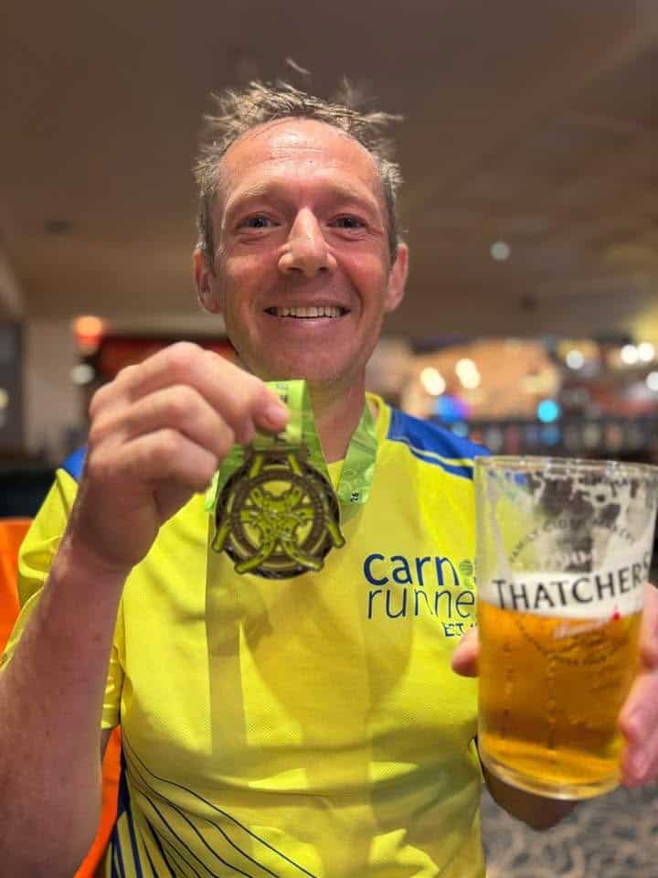 Carn Runner Steve running during the Three Shires Way Ultra across rural countryside trails