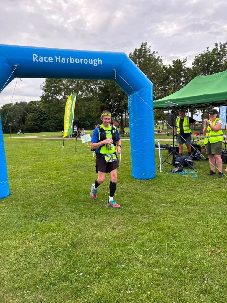 Carn Runner Steve running during the Three Shires Way Ultra across rural countryside trails