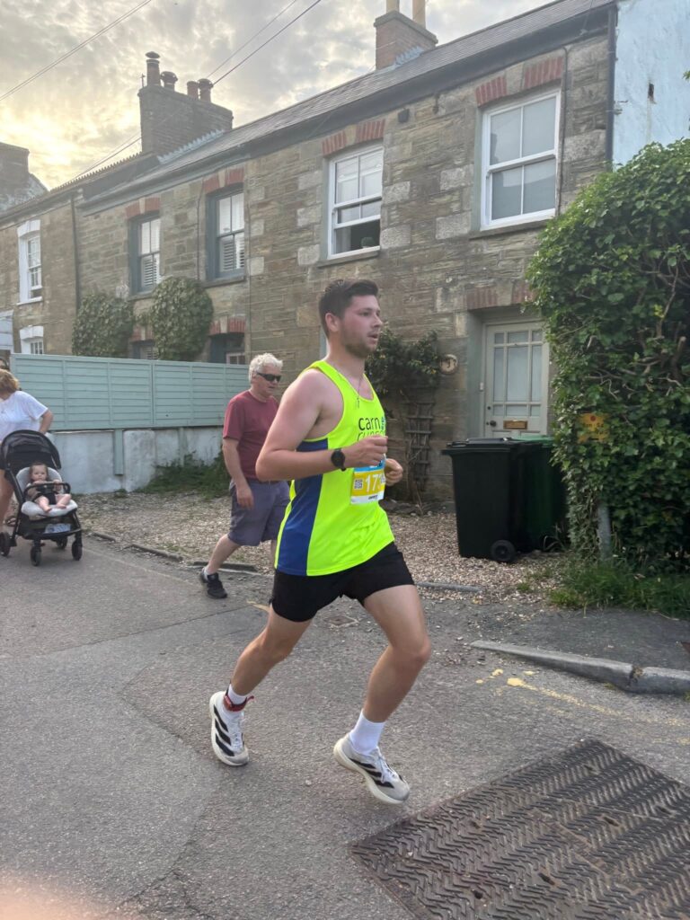 Carn Runners competing at the St Agnes 5 Miler in warm summer conditions