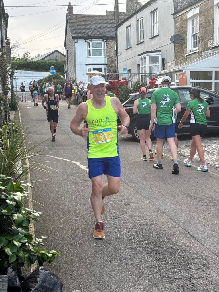 Carn Runners competing at the St Agnes 5 Miler in warm summer conditions