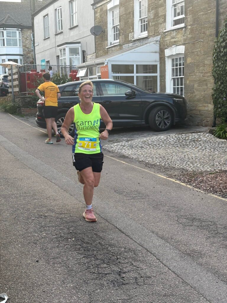 Carn Runners competing at the St Agnes 5 Miler in warm summer conditions