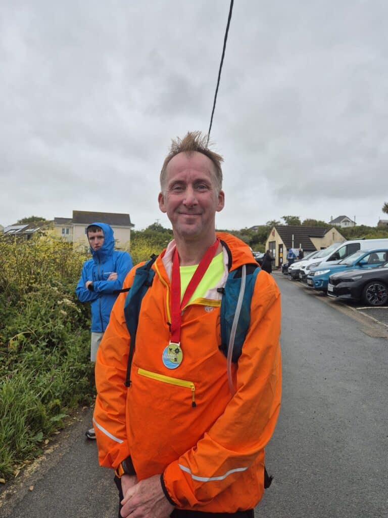 Carn Runners runners taking on the Classic Quarter coast path challenge from Lizard Point to Land's End
