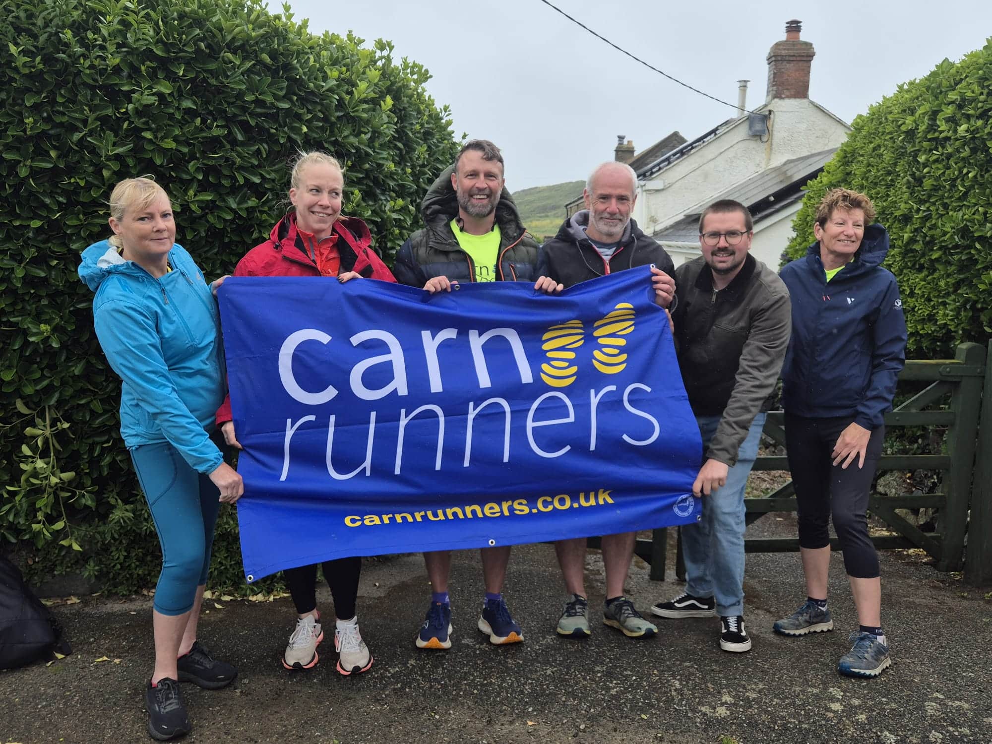 Carn Runners runners taking on the Classic Quarter coast path challenge from Lizard Point to Land's End