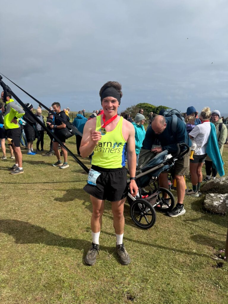 Carn Runners runners taking on the Classic Quarter coast path challenge from Lizard Point to Land's End