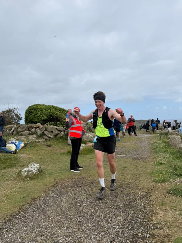 Carn Runners runners taking on the Classic Quarter coast path challenge from Lizard Point to Land's End