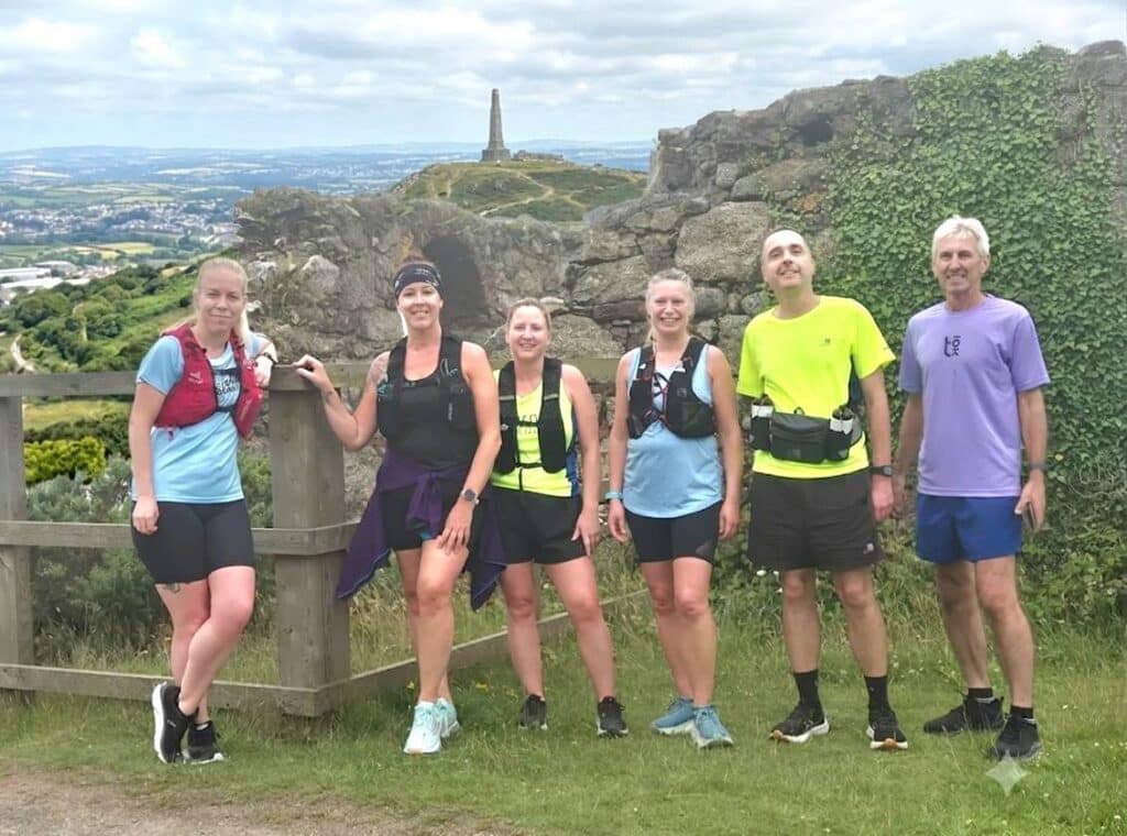 Carn Runners enjoying a Sunday social run on the Great Flat Lode while Vicky represents the club in France