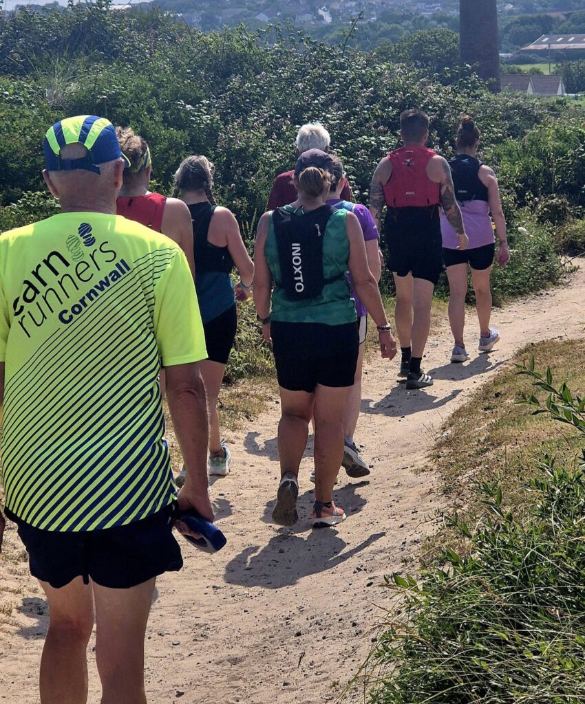 Carn Runners enjoying Friday and Sunday social runs through woodland, coastal paths and scenic Cornish trails