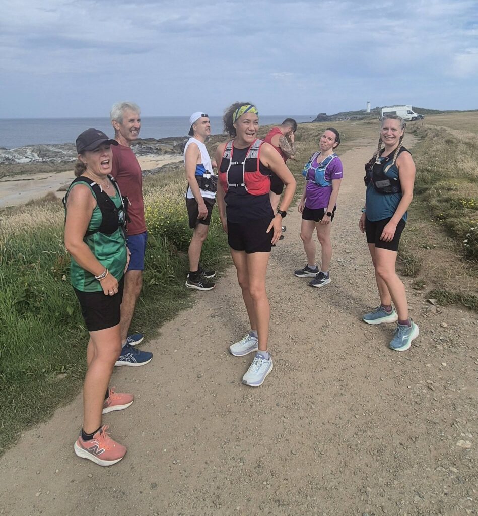 Carn Runners enjoying Friday and Sunday social runs through woodland, coastal paths and scenic Cornish trails