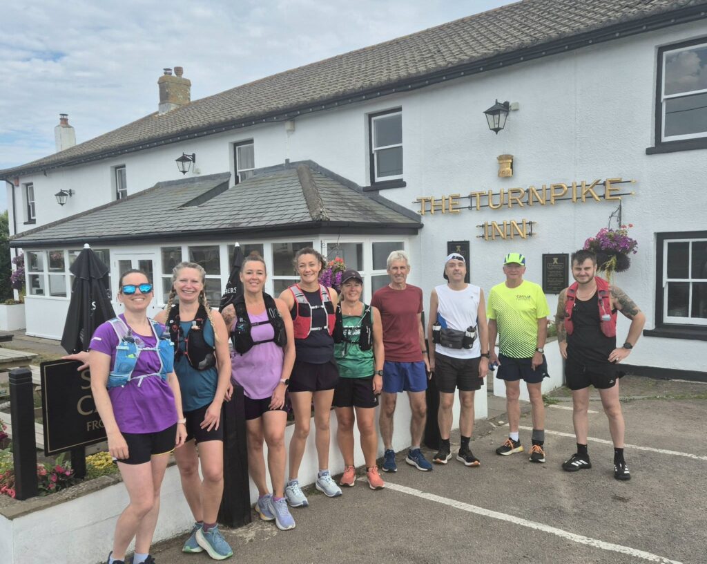 Carn Runners enjoying Friday and Sunday social runs through woodland, coastal paths and scenic Cornish trails