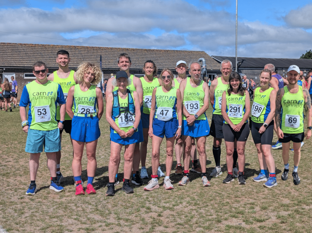 Carn Runners competing at the Magnificent 7 race in Saltash with age category winners and team success