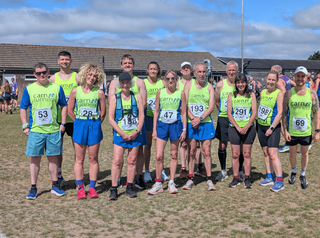 Carn Runners competing at the Magnificent 7 race in Saltash with age category winners and team success